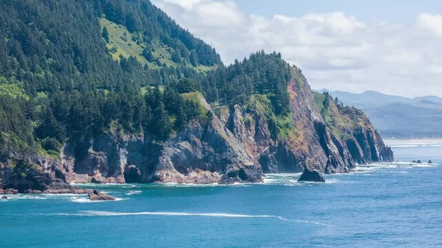 4K footage of Oswald West State Park in Oregon. Shows the lush coastal rainforest with ocean views, evergreen trees, and rugged cliffs.