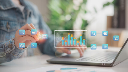 Business hand analyzing big data dashboard with cloud computing icons, digital graphs, and futuristic analytics. Concept for data analysis, AI, and business intelligence systems.