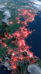 Fototapeta premium An aerial view of a densely populated city illuminated at night, highlighting urban infrastructure and networks.