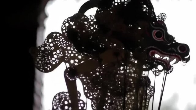 Ethereal Glow Silhouettes Intricate Javanese Wayang Kulit Puppet in Motion