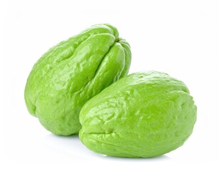 Fototapeta premium Chayote Squash: Two vibrant green chayote squashes, showcasing the natural textures and freshness, set against a clean and appealing backdrop.