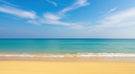 Obraz premium Blurred beach scene, vibrant blue sky and ocean