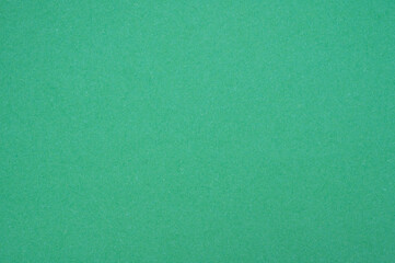 Full frame shot of light green paper sheet texture and background.