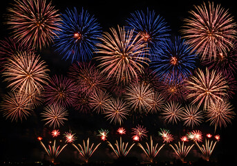 Fototapeta premium Fireworks display in night sky
