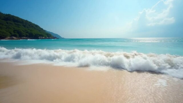 Waves on a sandy beach. May Khao beach in the north of Phuket, slow motion