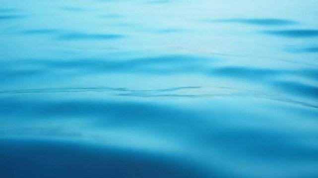 a blue wave of water is moving across the surface