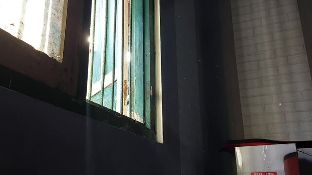 Tyndall effect footage, which is a natural phenomenon that occurs when light passes through a medium containing small particles such as dust, smoke, or colloids.