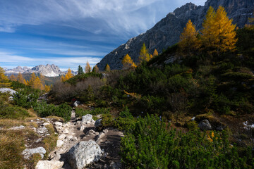 The specular landscape of Sorapis trail between hike to lake in Autumn season, Dolomite, Italy.