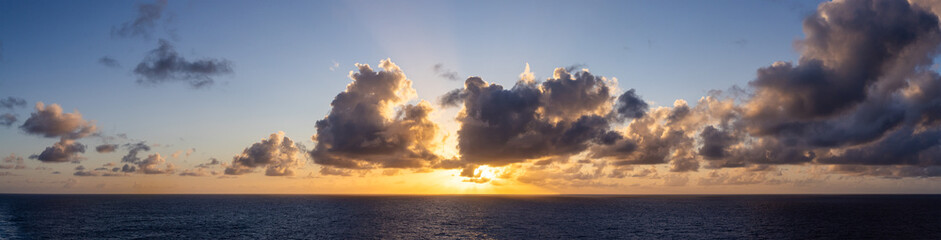 Serene Sunset Over the Pacific Ocean With Stunning Cloudscape