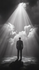 Man Standing in Light Rays Amid Clouds in Sky
