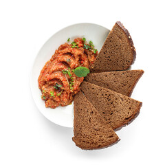 Delicious eggplant salad with greens and slices of bread in plate isolated on white background. Healthy vegan food, top view, close up