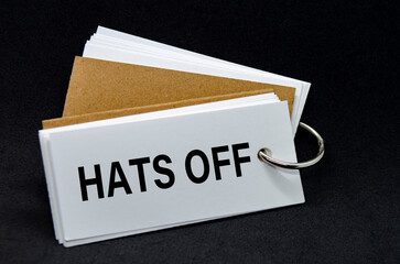 HATS OFF text on white notepad. A Simple Gesture, A Powerful Message of Recognition and...