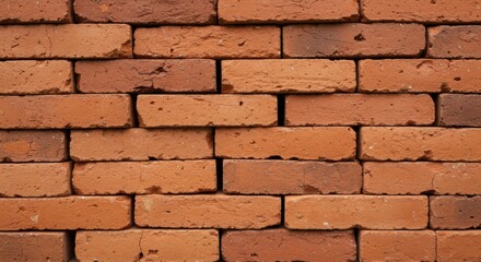 Fototapeta premium Close up of a red brick wall texture background for construction and design material seamless pattern