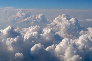 Aerial View of Fluffy White Clouds Against a Blue Sky at Daytime Landscape