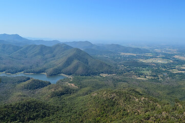 Fototapeta premium Distant Mountains and Forest with Trees and Sky in Northern Thailand.