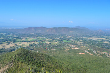 Fototapeta premium Distant Mountains and Forest with Trees and Sky in Northern Thailand.