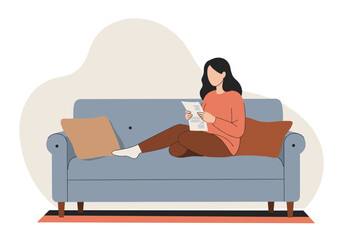 Young woman sitting on sofa holding grocery receipt at home  