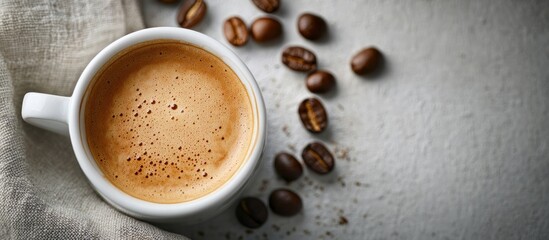 Fototapeta premium cup of coffee with beans