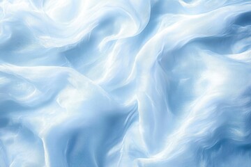Obraz premium Soft flowing light blue silk fabric with gentle folds and smooth texture creating a calming and elegant atmosphere