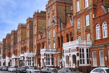 Fototapeta premium Ornate old brick townhouses in London Borough of Kensington