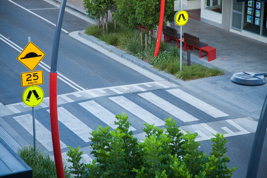 Pedestrian crossing on a speed hump on urban street