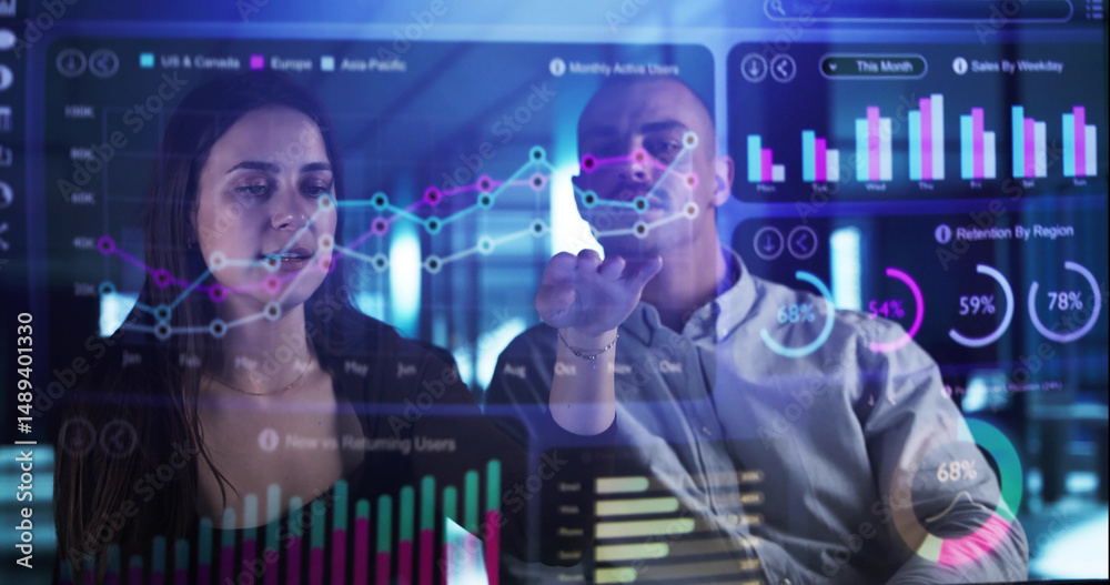 Poster man and woman analyzing financial data on holographic office dashboard