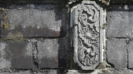 Intricate Stone Carving Detail on Ancient Wall Architectural Fragment