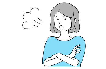 腕組みをして怒りの感情を表している若い女性