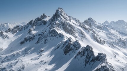 Obraz premium Snowy mountain peak landscape showcases winter scenery under a clear sky offering views of outdoor adventure and natural terrain