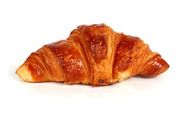Buttery croissant isolated on a white background. Golden and flaky French pastry.