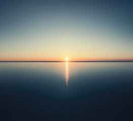 Obraz premium Serene sunset over calm water