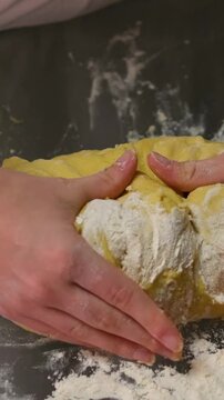 cheff Hands kneading dough on table preparing bread pastry yeast flour Cooking food concept background slow motion. High quality 4k footage