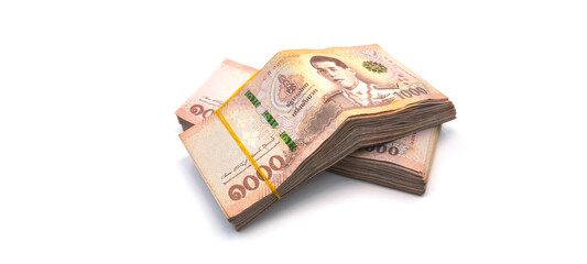 1.000 baht banknotes stacked on a white background. Finance and currency concept. Exchange rate.