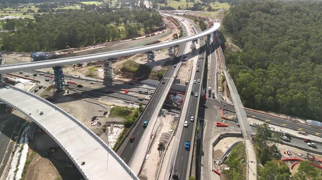 Aerial drone view above the M7 -M12 Interchange at Cecil Hills, Western Sydney, NSW Australia on a sunny morning in May 2025