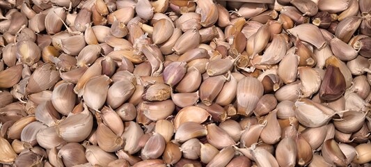 Fresh garlic in the store. Garlic for background.