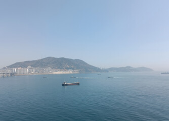 Korea, Busan, view of coastline and ships