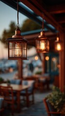 Warm vintage copper lanterns hanging from wooden beams at outdoor restaurant terrace during sunset, creating cozy ambiance for evening dining experience with soft glowing Edison bulbs