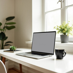 Minimalist home office workspace with laptop plant and coffee cup on a bright desk