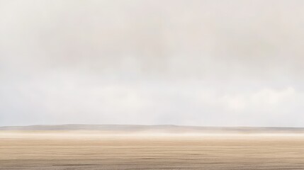 Rain Falling Over a Tranquil White Desert Landscape Under Soft Sky