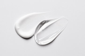 A sample of white and transparent cosmetic cream