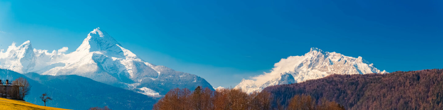 High resolution stitched alpine spring panorama with Mount Watzmann and Mount Hochkalter on a sunny day at Berchtesgaden, Bavaria, Germany