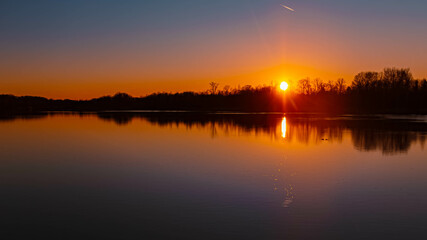 Spring sunset or sundowner with reflections near Niederpoering, Isar, Oberpoering, Deggendorf,...