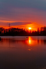 Spring sunset or sundowner view with reflections near Plattling, Isar, Deggendorf, Bavaria, Germany