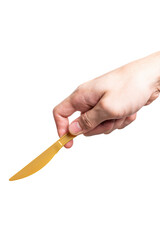 Male hand holding a gold plastic cooking knife isolated on white background.