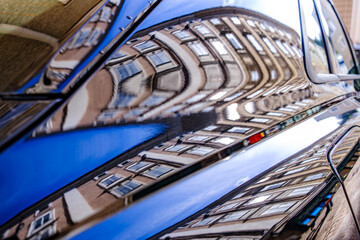 Fototapeta premium typical reflection of a facade at a car