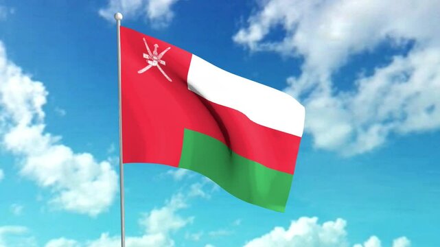 The national flag of Oman, flying against a cloudy blue sky.