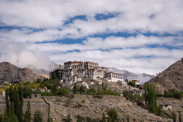 Naklejka premium Likir, India - September 20, 2024: Exterior of Likir Gompa, a Buddhist monastery in Leh district