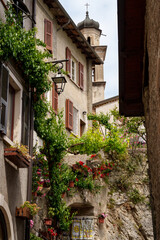 Limone sul Garda, Lake Garda, Trentino, Italy. Idyllic alley with floral decorations. Travel photography