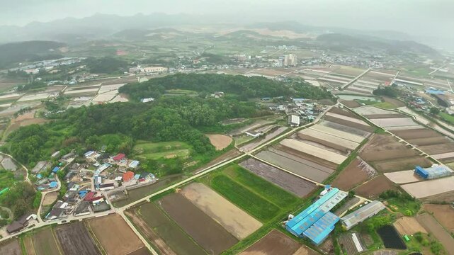 his drone footage, taken on May 17, 2025 in Nakseong-ri, Haepyeong-myeon, Gumi-si, North Gyeongsang Province, shows farmland preparing for rice farming. Suitable for editorial use.