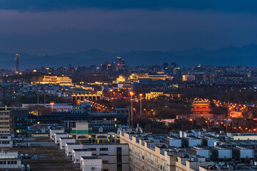 The scenery of ancient and modern architecture in Beijing, China under the night